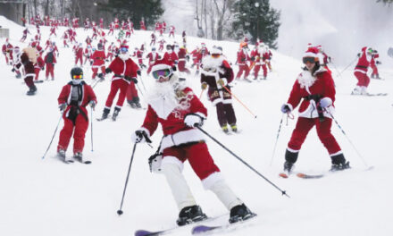 It’s All Downhill For 300 Skiing Santa’s, A Grinch, And A Tree