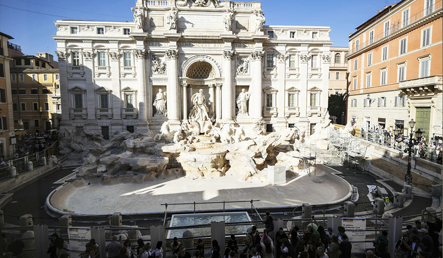 Tourists Toss Coins Over A  Pool As Rome’s Trevi Fountain Undergoes Maintenance