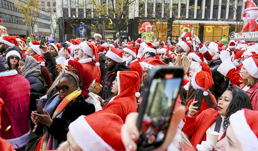 Thousands Of Santas And A Few Grinches Hit The Streets For SantaCon Bar Crawls