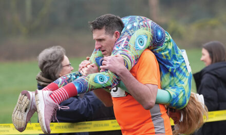 Finnish Pair Wins A Barrel Of Ale In Annual ‘Wife-Carrying’  Contest In England